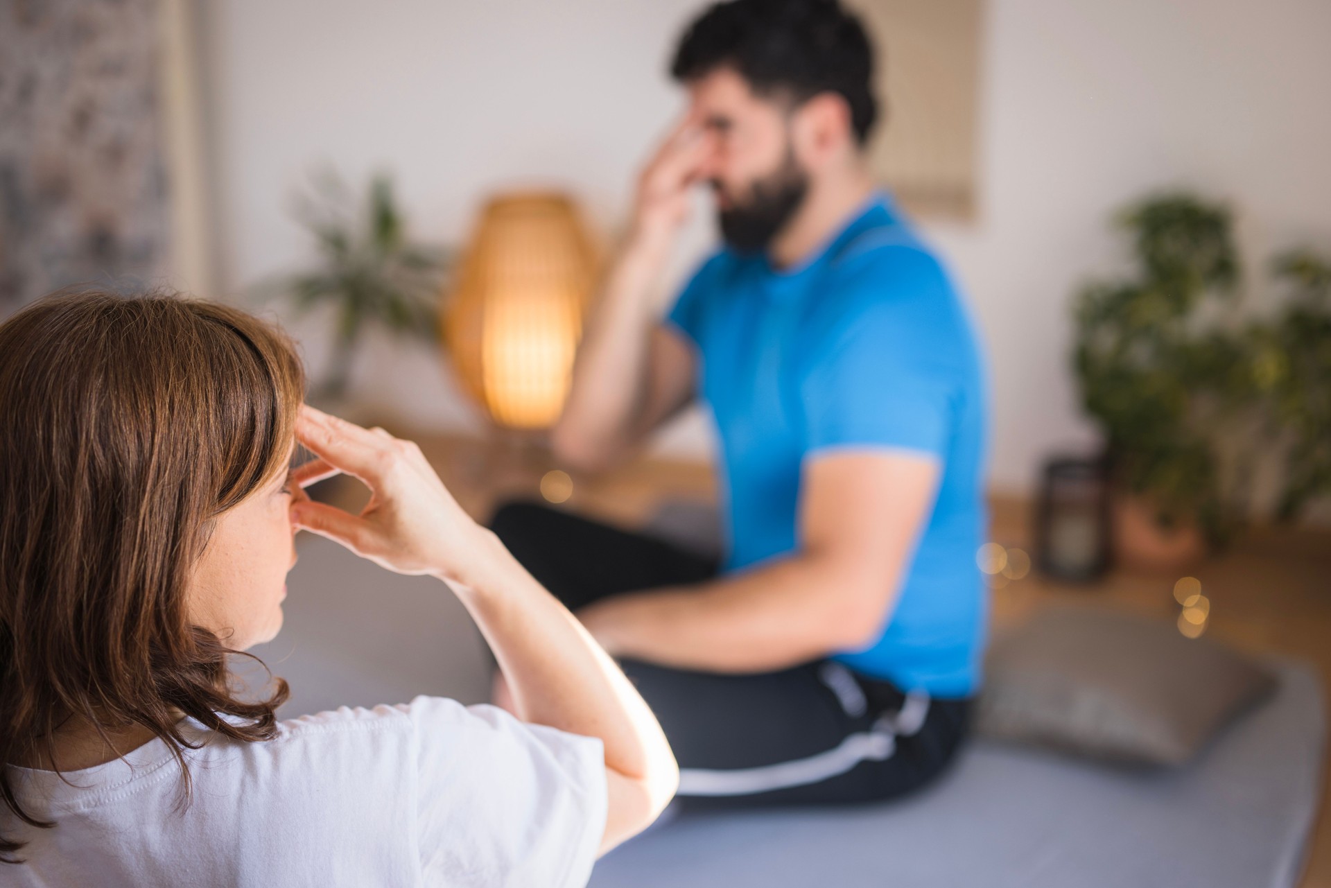 People exercising conscious breathing yoga